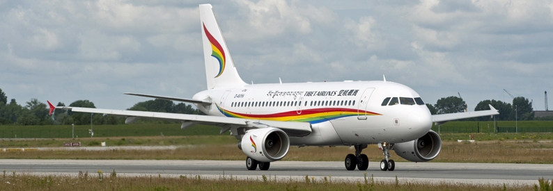 China investigates three former Tibet Airlines execs