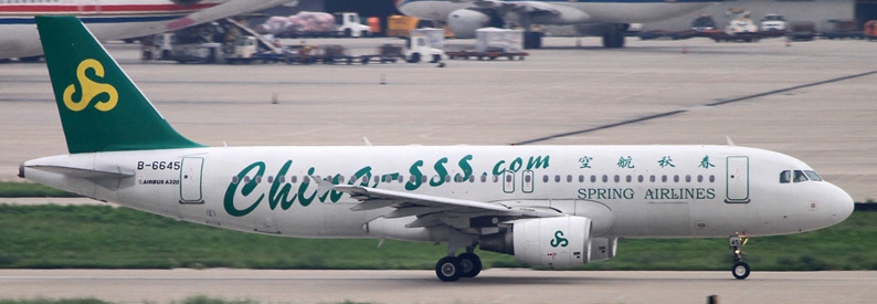 Founder of China's Spring Airlines hands stake to eldest son